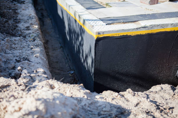 Professional Basement Waterproofing technician working in Christiana, TN